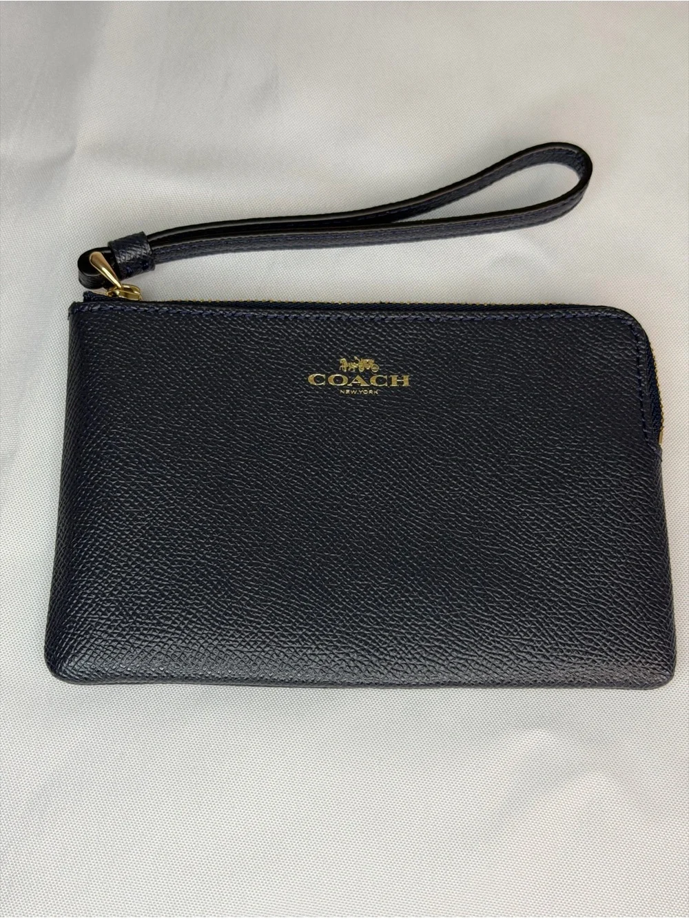 Coach Navy Leather Wristlet with Gold Logo Accent